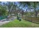 Long driveway leading to home with gated entrance at 7051 Turtle Ln, Sarasota, FL 34241