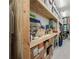 Large storage area with plenty of shelving for various items at 7051 Turtle Ln, Sarasota, FL 34241