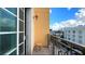 Private balcony overlooks city views and features a small table at 750 N Tamiami Trl # 420, Sarasota, FL 34236