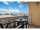 Private balcony with table and chairs and city views at 750 N Tamiami Trl # 420, Sarasota, FL 34236