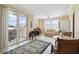Sunlit living room with access to a balcony and city views at 750 N Tamiami Trl # 420, Sarasota, FL 34236