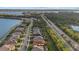 Wide shot of community, showcasing homes and lake views at 7781 Grande Shores Dr, Sarasota, FL 34240