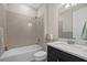 Clean bathroom with a shower/tub combo and modern vanity at 7781 Grande Shores Dr, Sarasota, FL 34240