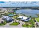 Aerial view of LakeHouse Cove amenities including clubhouse and pool at 8089 Sandstar Way, Sarasota, FL 34240