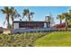 LakeHouse Cove at Waterside community entrance sign with lush landscaping at 8089 Sandstar Way, Sarasota, FL 34240