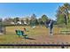 Fenced dog park with benches and agility equipment at 8089 Sandstar Way, Sarasota, FL 34240