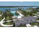 Aerial view of LakeHouse Cove's pool, clubhouse, and landscaping at 8089 Sandstar Way, Sarasota, FL 34240
