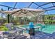 Relax by the refreshing pool and spa; a perfect outdoor oasis at 8089 Sandstar Way, Sarasota, FL 34240