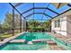 Escape to your own private oasis with this screened pool and spa at 8089 Sandstar Way, Sarasota, FL 34240