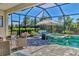 Enclosed pool and spa area with plenty of seating. Enjoy the Florida sunshine! at 8089 Sandstar Way, Sarasota, FL 34240