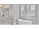 Elegant bathroom featuring a soaking tub and dual vanities at 8544 Pavia Way, Bradenton, FL 34202