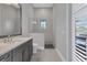 Bathroom with a walk-in shower and modern finishes at 8544 Pavia Way, Bradenton, FL 34202