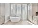 Luxurious bathroom with a freestanding tub and walk-in shower at 8544 Pavia Way, Bradenton, FL 34202