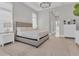 Main bedroom with king bed, ensuite bathroom access, and ample closet space at 8544 Pavia Way, Bradenton, FL 34202