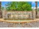 Elegant entrance to The Lake Club community with stone fountain at 8544 Pavia Way, Bradenton, FL 34202