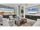 Bright living room with large windows and access to a covered patio at 8544 Pavia Way, Bradenton, FL 34202