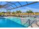 Relaxing pool and spa area with lake view at 8544 Pavia Way, Bradenton, FL 34202