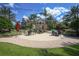 Relaxing pool patio with seating and umbrellas at 8544 Pavia Way, Bradenton, FL 34202