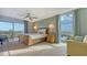 Relaxing bedroom with a bamboo bed frame and ocean view at 101 Benjamin Franklin Dr # 54, Sarasota, FL 34236
