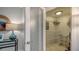 Condo entry closet with wire shelving, providing ample storage space at 101 Benjamin Franklin Dr # 54, Sarasota, FL 34236