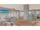 Spacious community room with multiple tables and chairs at 101 Benjamin Franklin Dr # 54, Sarasota, FL 34236