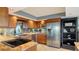 Modern kitchen with stainless steel appliances and granite countertops at 101 Benjamin Franklin Dr # 54, Sarasota, FL 34236