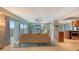 Spacious living room with sliding glass doors leading to a balcony and city views at 101 Benjamin Franklin Dr # 54, Sarasota, FL 34236