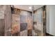 Walk-in shower with multi-toned tile surround at 101 Benjamin Franklin Dr # 54, Sarasota, FL 34236