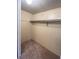 Spacious walk-in closet with hanging rod and shelves at 103 Oakwood Blvd, Sarasota, FL 34237
