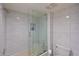 Clean bathroom with a large shower and white tile at 114 Tidy Island Blvd, Bradenton, FL 34210