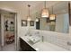 Bathroom with a contemporary white subway tile and a modern sink at 114 Tidy Island Blvd, Bradenton, FL 34210