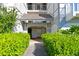 Attractive building entrance with landscaping and a walkway at 114 Tidy Island Blvd, Bradenton, FL 34210
