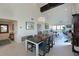 Open dining area with ample seating and views into living room at 114 Tidy Island Blvd, Bradenton, FL 34210