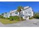 Two-story home with a garage and lush landscaping at 114 Tidy Island Blvd, Bradenton, FL 34210