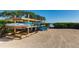 Kayak storage rack on the beach, near a sandy shore, promising watersport adventures at 114 Tidy Island Blvd, Bradenton, FL 34210
