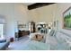 Inviting living room with vaulted ceilings and open floor plan with natural light and stylish decor at 114 Tidy Island Blvd, Bradenton, FL 34210