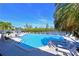 Beautiful pool with stunning water view and ample lounging space under the warm sunshine at 114 Tidy Island Blvd, Bradenton, FL 34210