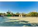Community tennis courts with a shaded seating area at 114 Tidy Island Blvd, Bradenton, FL 34210