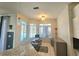 Bright office space with large windows, desk, and ample storage at 13634 7Th Avenue Ne Cir, Bradenton, FL 34212
