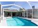 Inviting screened-in pool with a patio area perfect for outdoor relaxation and entertainment at 13634 7Th Avenue Ne Cir, Bradenton, FL 34212