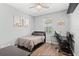 Cozy bedroom featuring a comfortable bed and a dedicated workspace at 14706 5Th Ne Ter, Bradenton, FL 34212