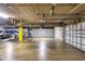 Spacious parking garage featuring designated parking spots for boats and other vehicles at 2124 N Tamiami Trl # 103, Sarasota, FL 34234