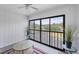 Relaxing lanai with a view of trees and water, perfect for enjoying the outdoors at 2124 N Tamiami Trl # 103, Sarasota, FL 34234