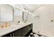 Spa-like bathroom with double sinks and a walk-in shower at 2516 Avenue A, Bradenton Beach, FL 34217