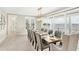 Elegant dining room with a large table and waterfront views at 2516 Avenue A, Bradenton Beach, FL 34217