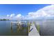 Private dock extending to the water with a lift at 2516 Avenue A, Bradenton Beach, FL 34217