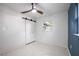 Bedroom with ceiling fan and updated closet doors at 3817 Buckeye Cir, Sarasota, FL 34232