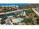 Aerial view of community pool, lake, and surrounding area at 4046 Overture Cir # 4046, Bradenton, FL 34209