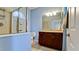 Bathroom with a shower/tub combo and wood vanity at 4046 Overture Cir # 4046, Bradenton, FL 34209