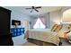Bedroom with a queen-size bed and blue accents at 4046 Overture Cir # 4046, Bradenton, FL 34209